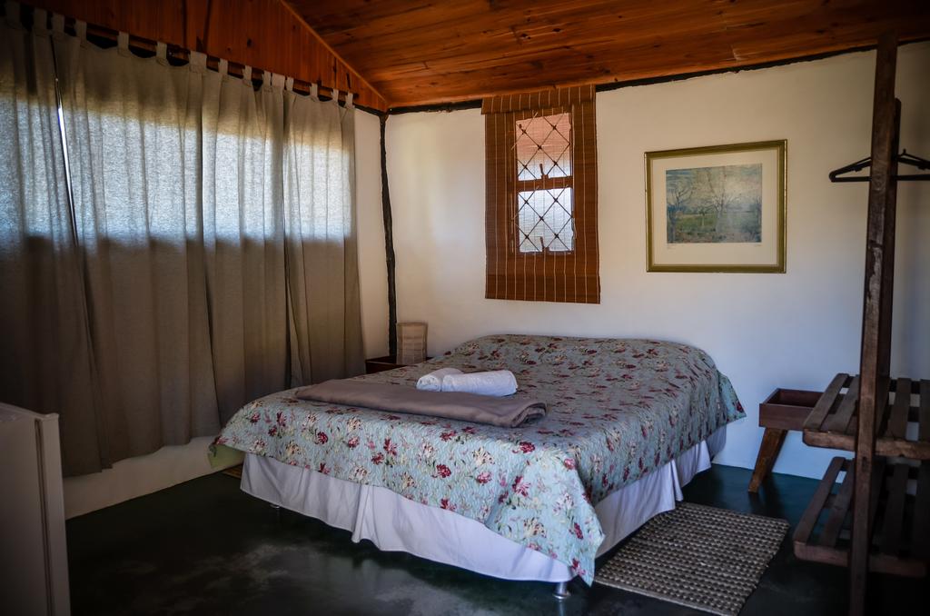 Quarto super confortável do Eco Hostel Catavento, uma ótima opção de onde ficar em Alto Paraíso.